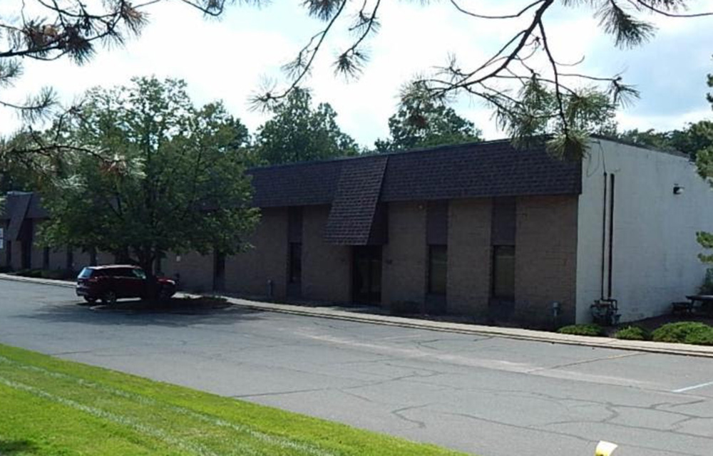 Damiani of Rand Commercial brokers sale of 25,000 s/f flex building